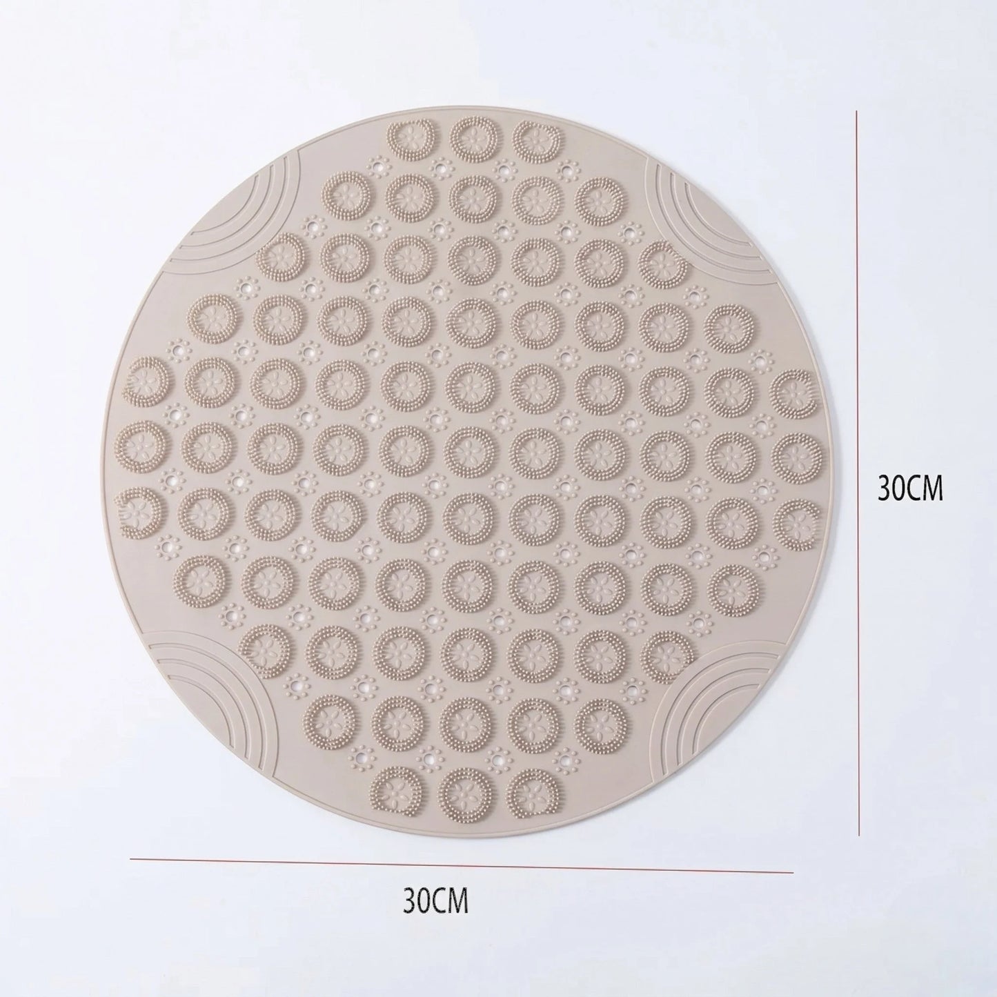 Dos du tapis rond beige avec ventouses en silicone pour fixation sur carrelage