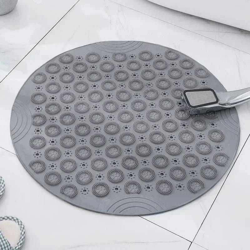 Tapis rond gris anthracite de bain Rondea, format 55 cm, ambiance douche à l'italienne