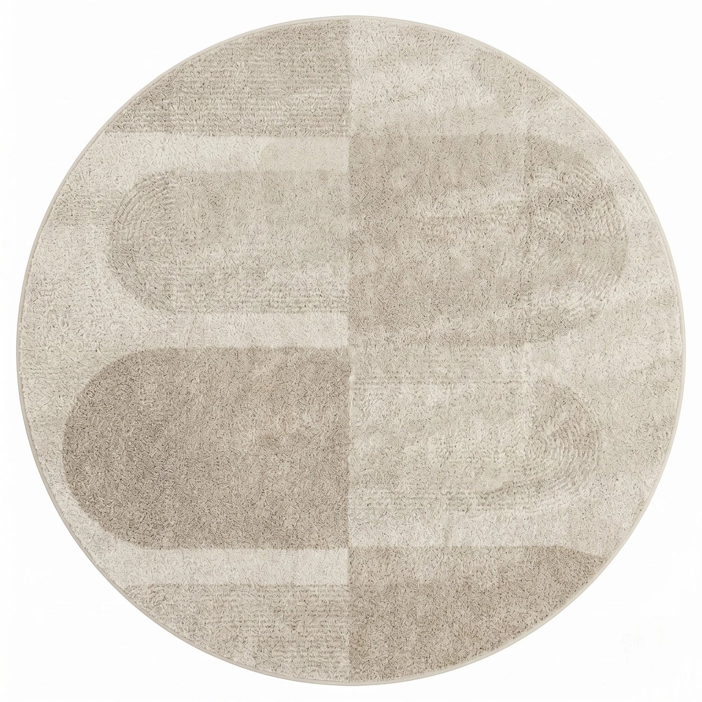 Vue de dessus du tapis rond beige blocs géométriques montrant le motif en pavés assemblés crème