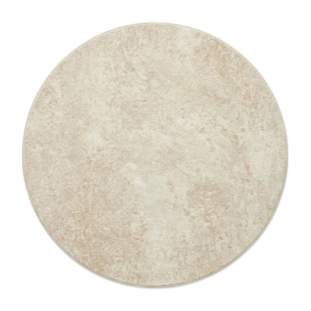 Tapis rond beige minimaliste uni, vue de dessus sur fond blanc