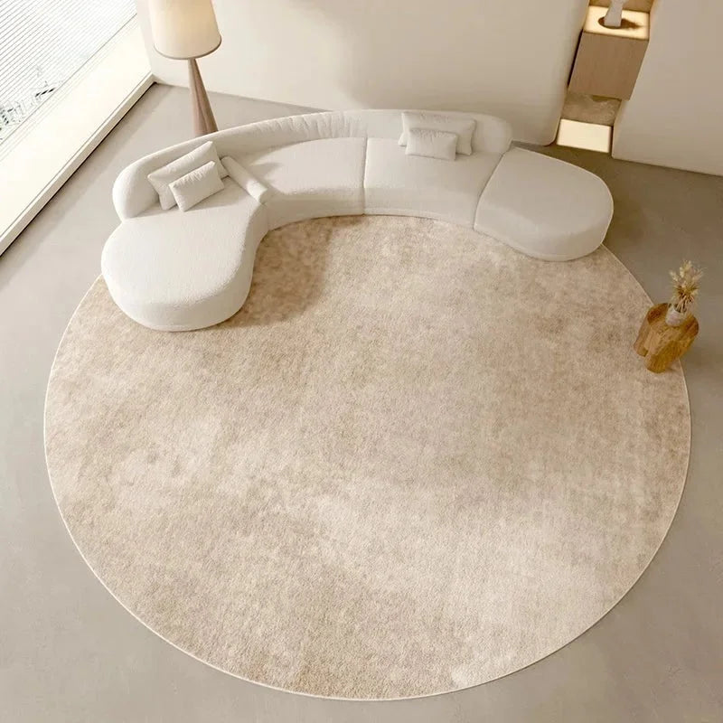 Rendu final du tapis rond beige minimaliste uni sous mobilier scandinave