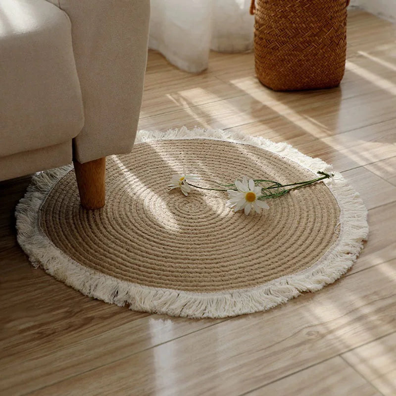 Photo originale du tapis rond coton tressé écru à pompons