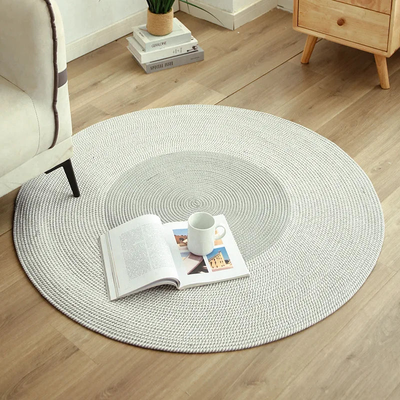 Photo originale du tapis rond coton tressé gris clair