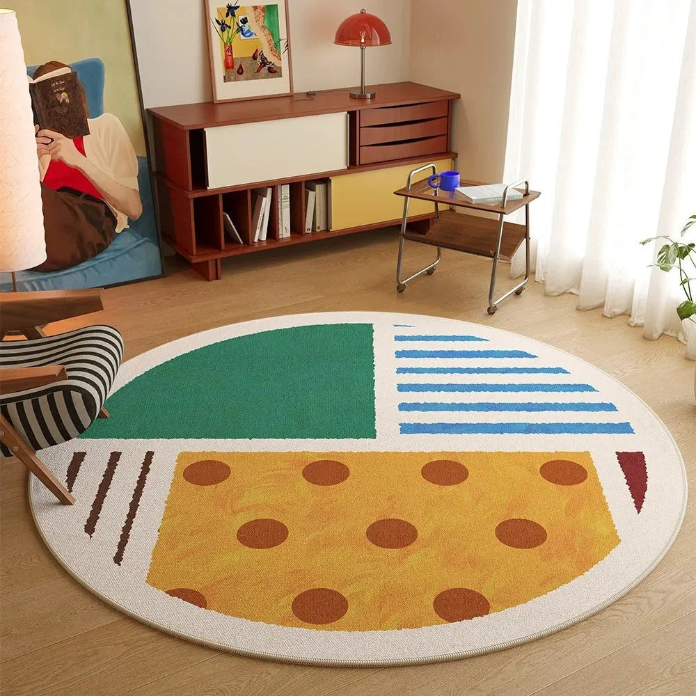 Tapis rond géométrique abstrait multicolore dans un studio créatif