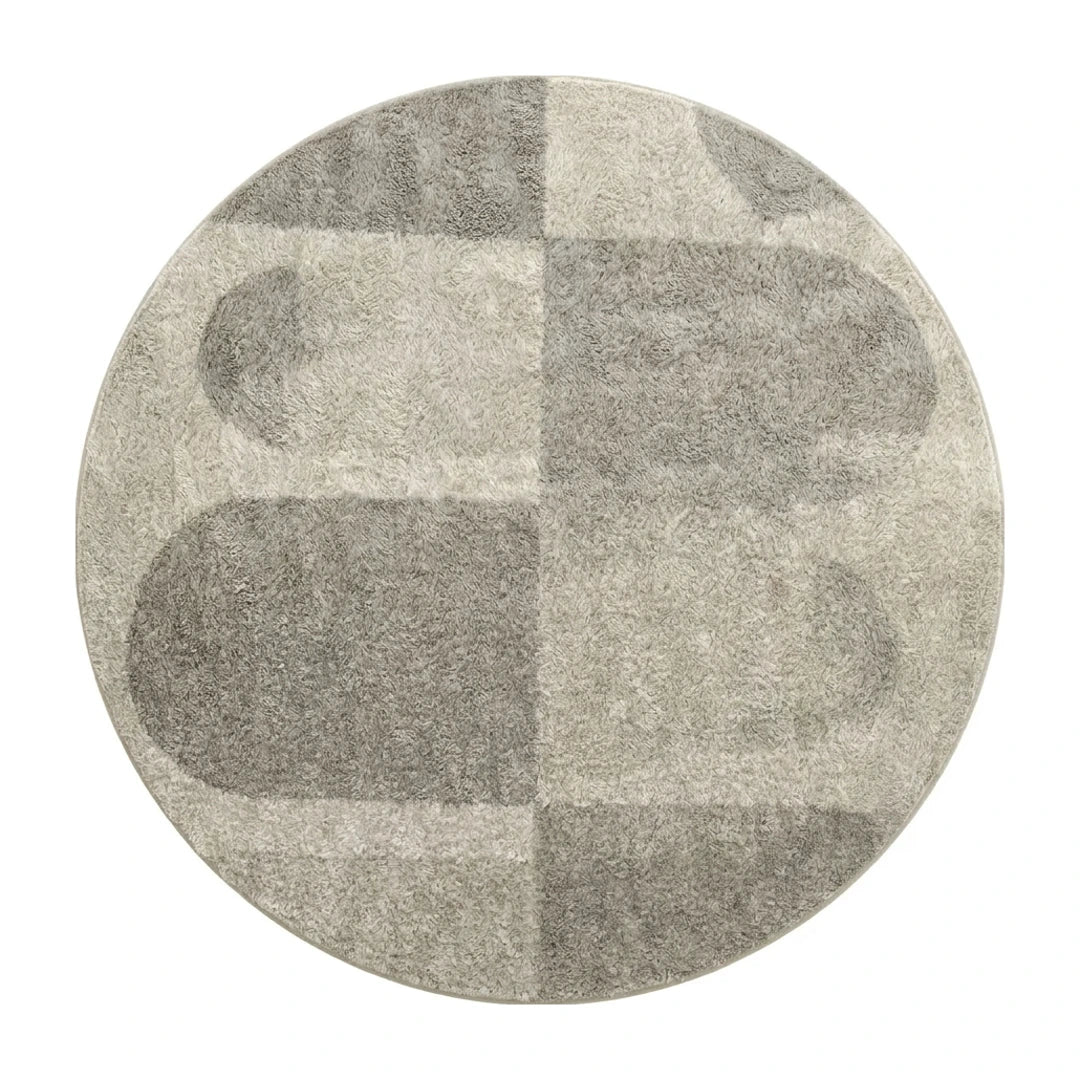 Tapis rond gris tracé organique, vue de dessus sur fond blanc