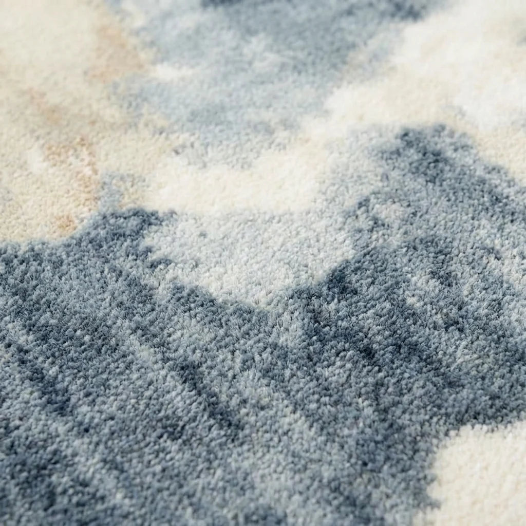 Velours imitation cachemire du tapis rond bleu nuage vu de près