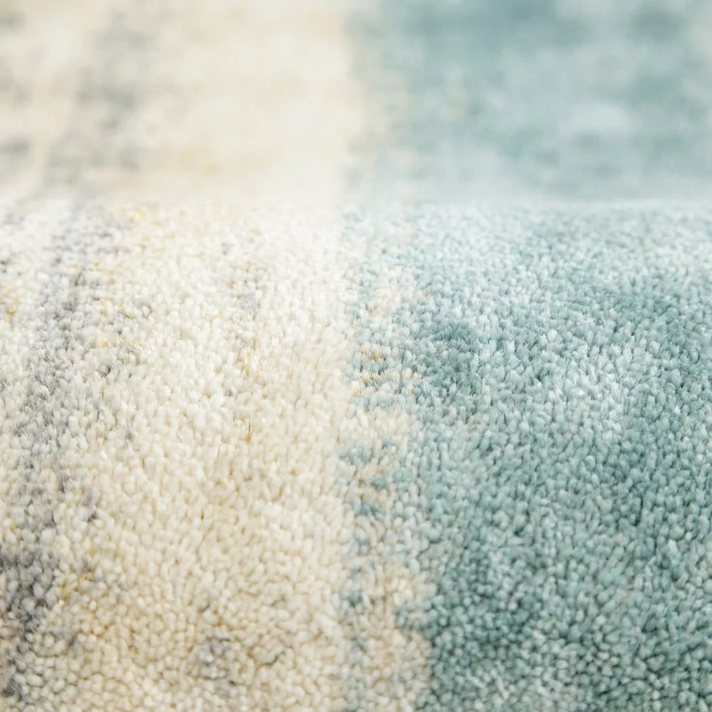 Velours imitation cachemire du tapis rond écru aqua vu de près