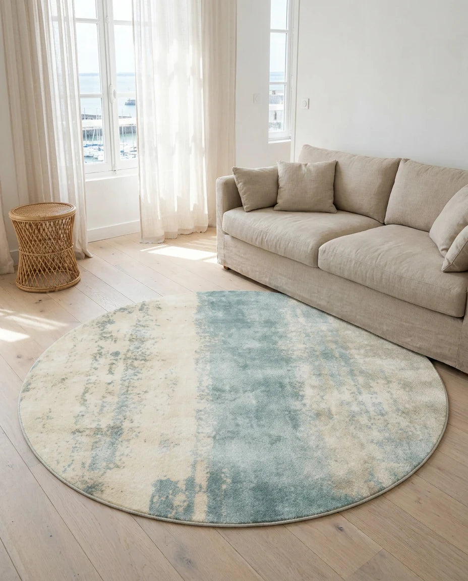 Tapis rond écru aqua dans une pièce en situation