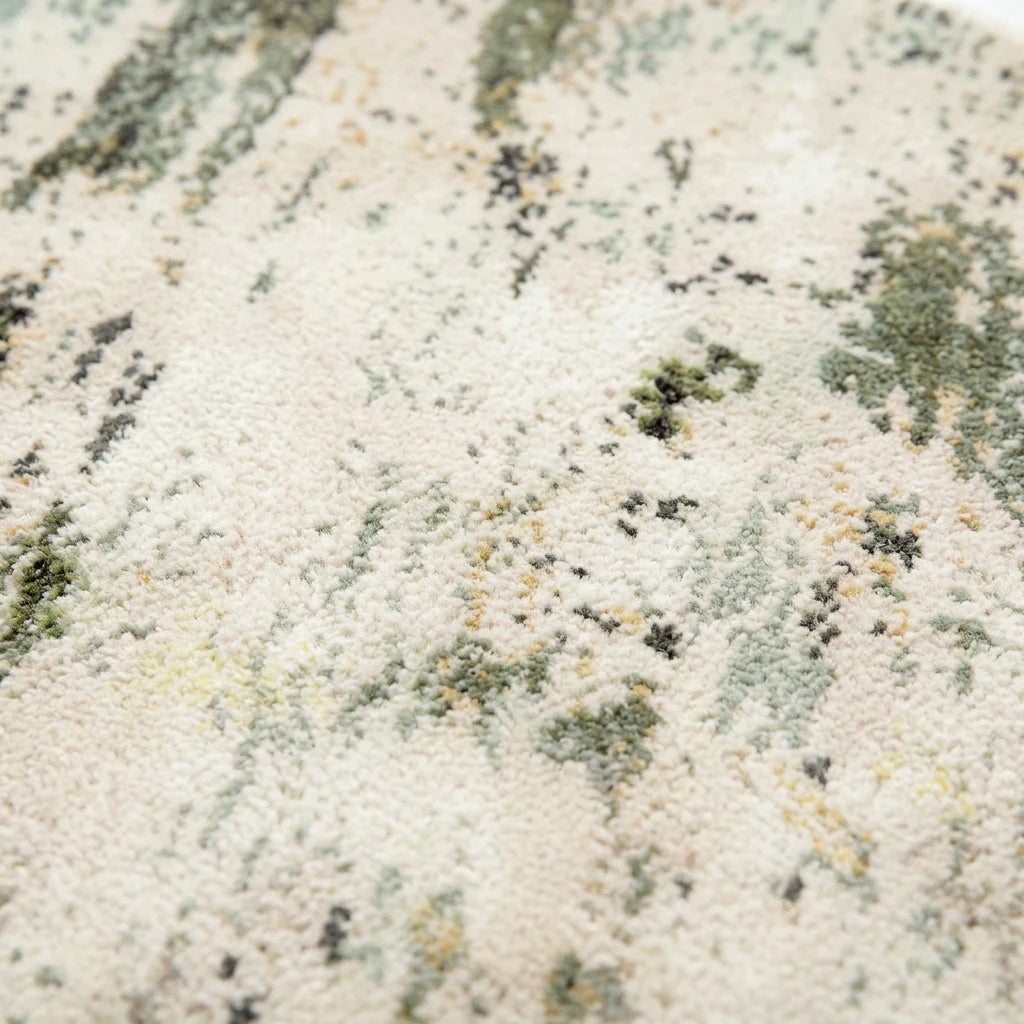 Velours imitation cachemire du tapis rond écru nuancé vu de près