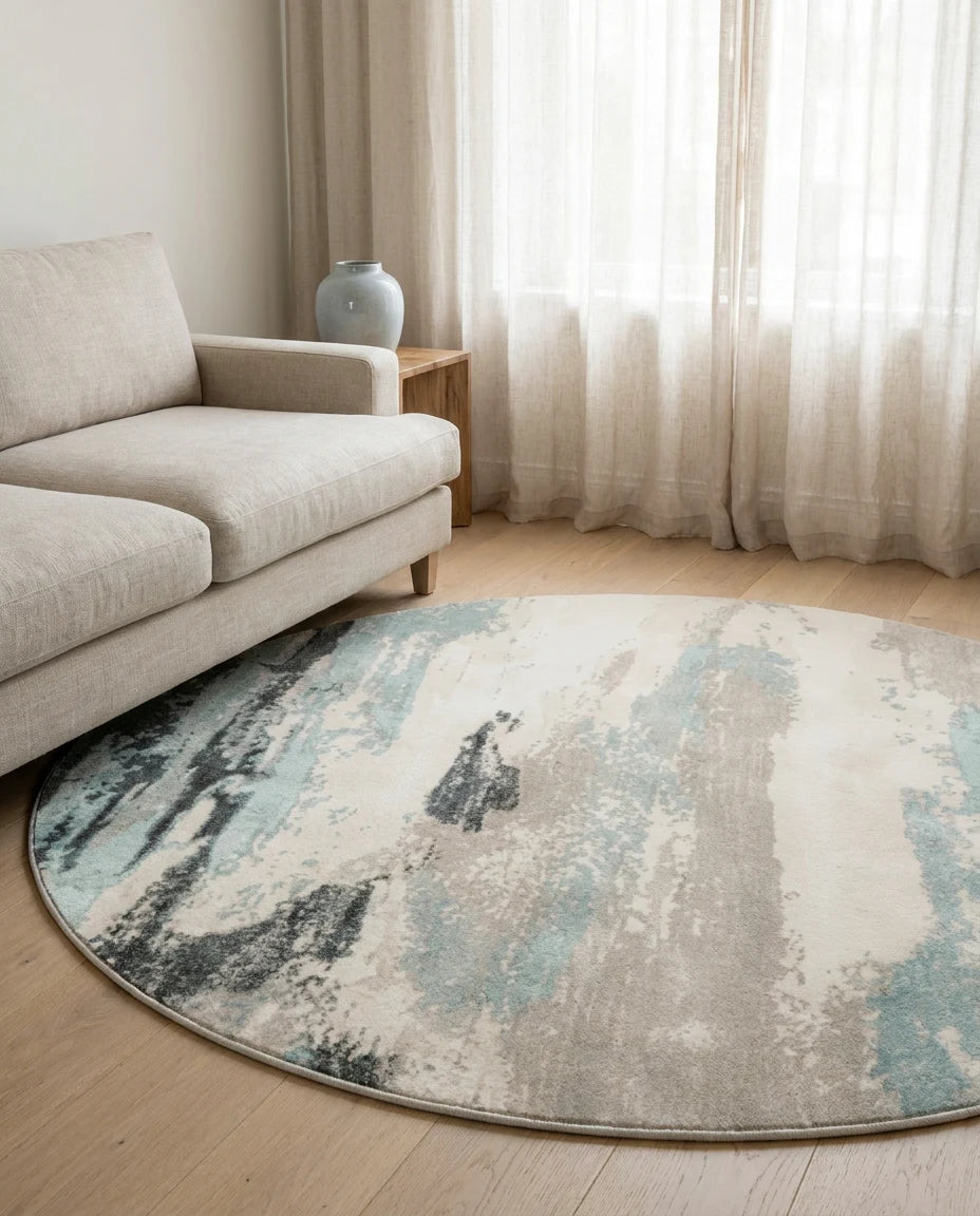 Tapis rond grège bleuté dans une pièce en situation