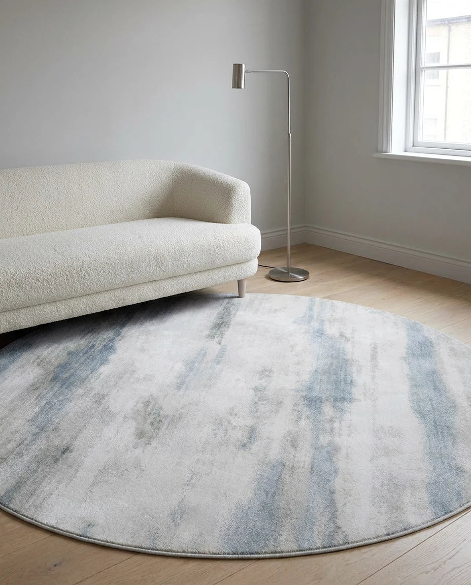 Tapis rond gris brume dans une pièce en situation