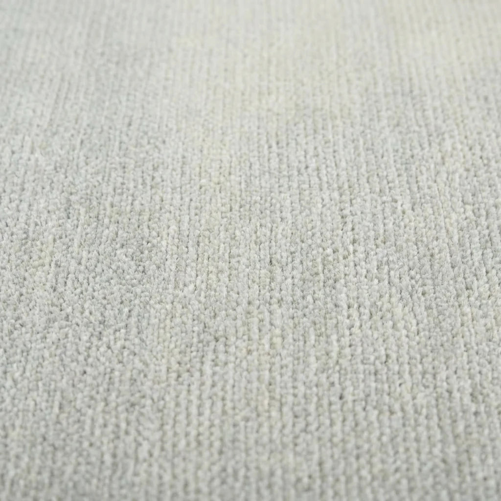 Velours imitation cachemire du tapis rond gris chiné vu de près