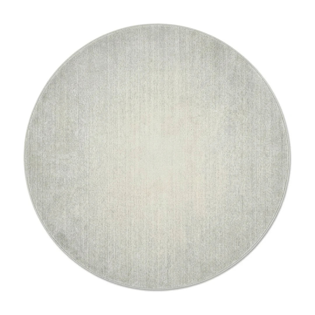 Tapis rond gris chiné vu de dessus sur fond blanc