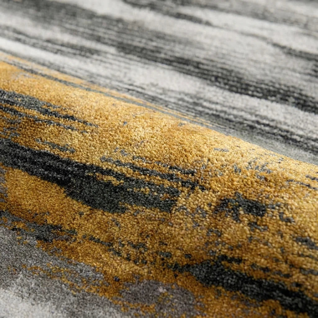 Velours imitation cachemire du tapis rond gris doré vu de près