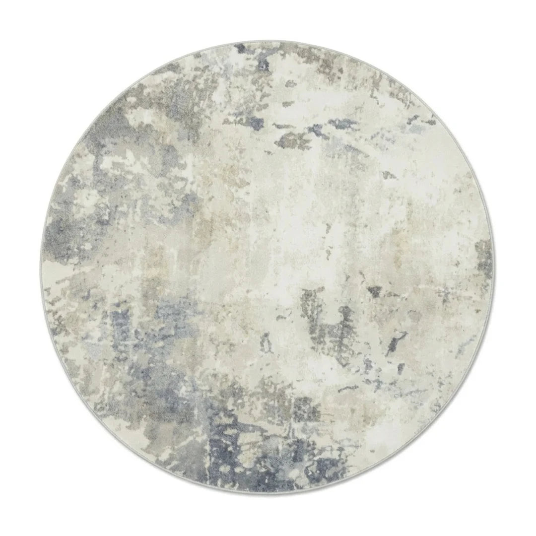 Tapis rond gris nuagé vu de dessus sur fond blanc