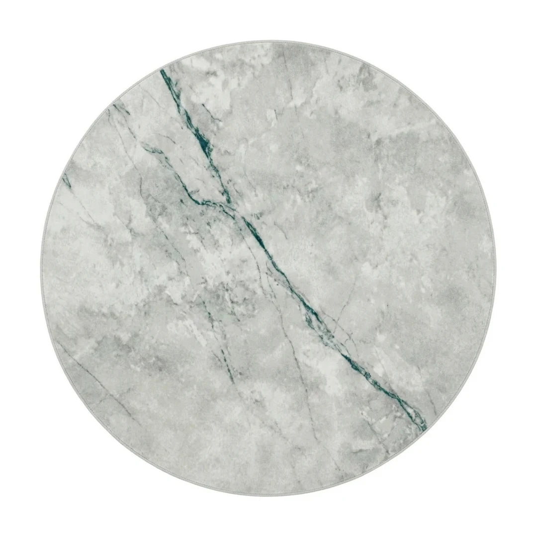 Tapis rond marbre gris vu de dessus sur fond blanc