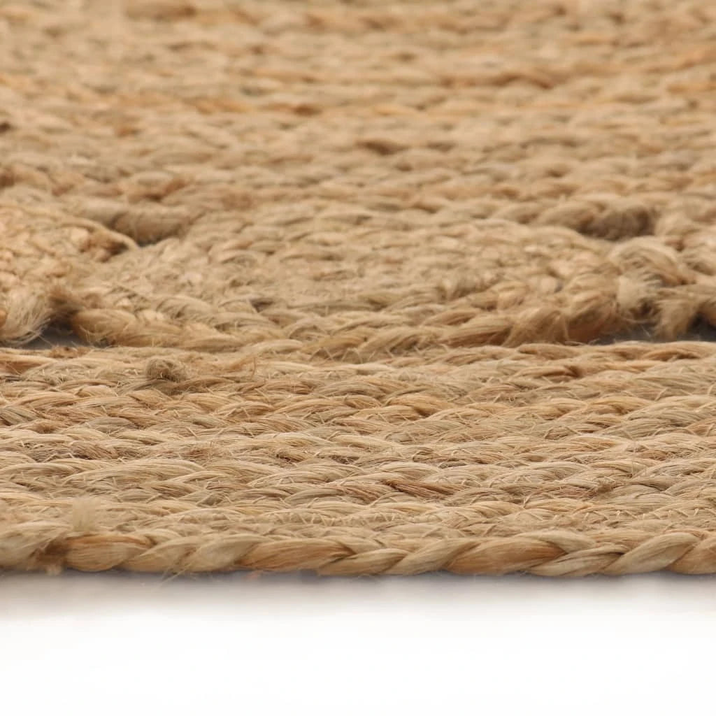 Tapis rond jute tressé main motif rosace en salon