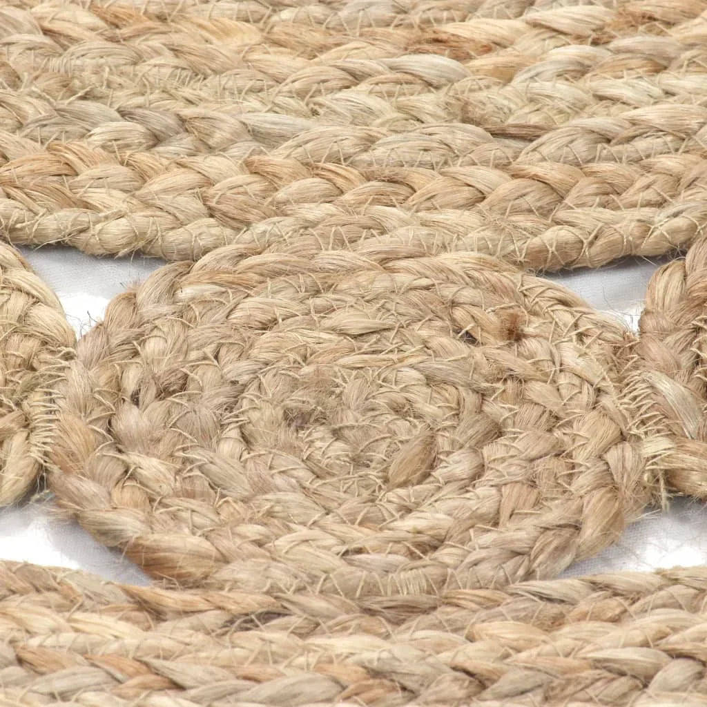 Tapis rond jute tressé main motif rosace détail brins