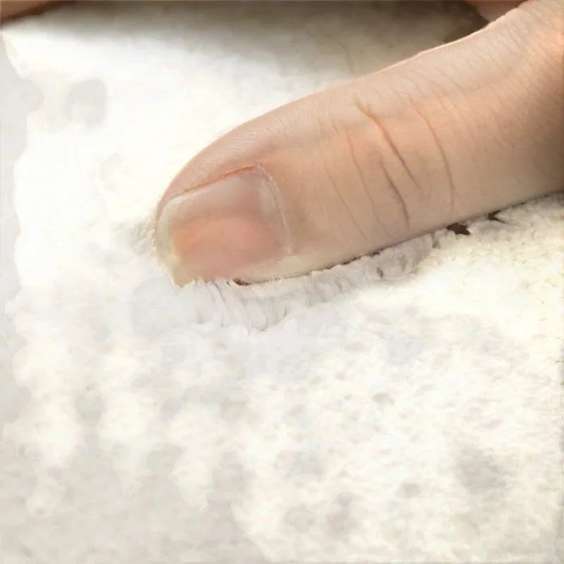 Toucher de la fibre dense du tapis rond rose poudré peluche douce