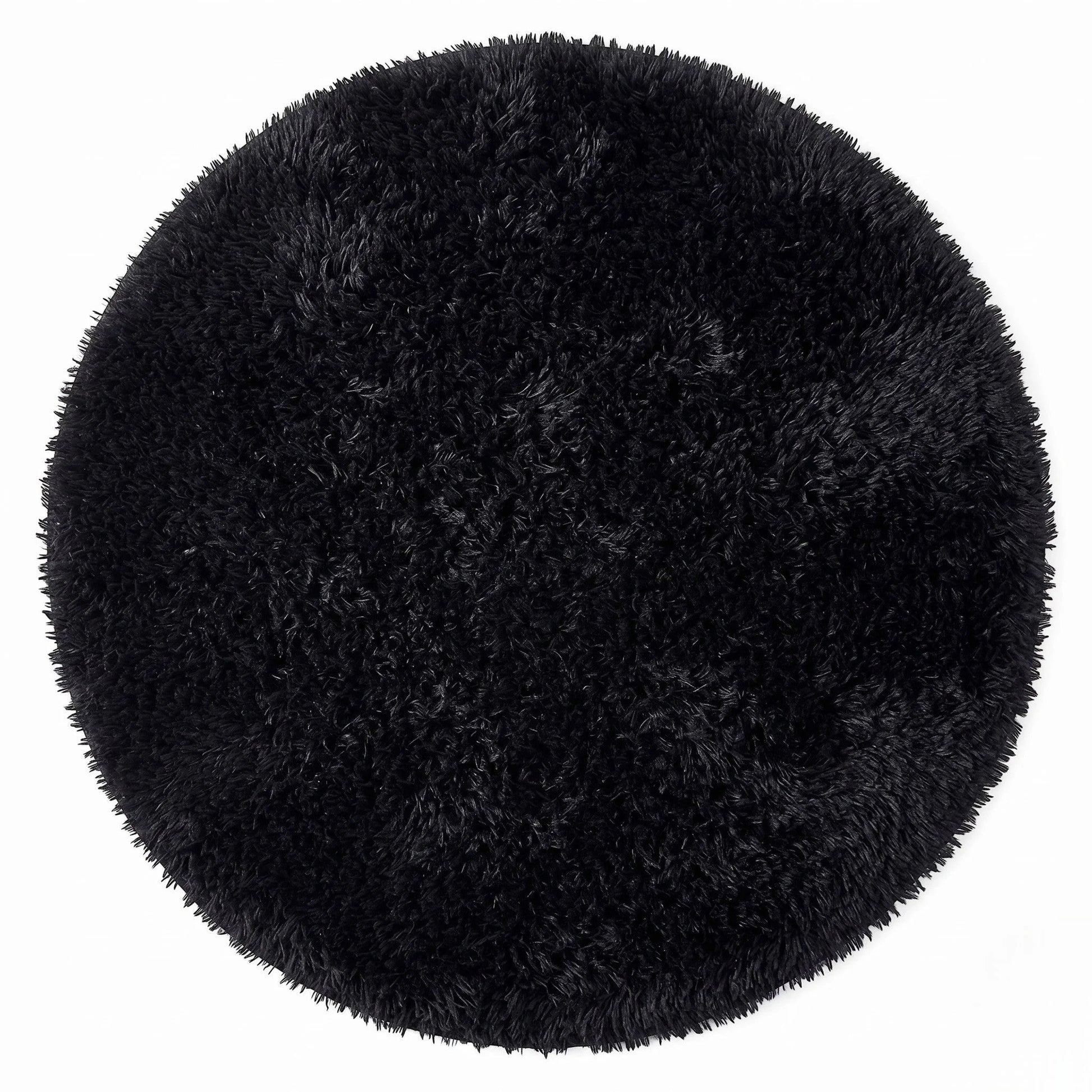 Vue studio du tapis rond salle de bain moelleux noir, peluche dense poil long