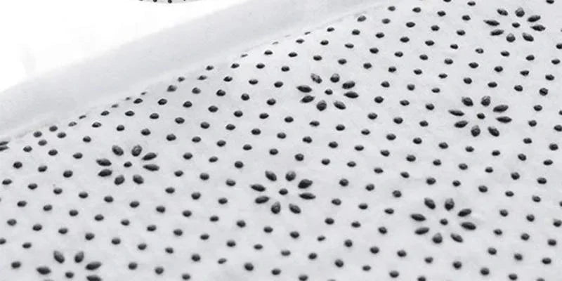 Sous-face à picots antidérapants du tapis, photo du fabricant