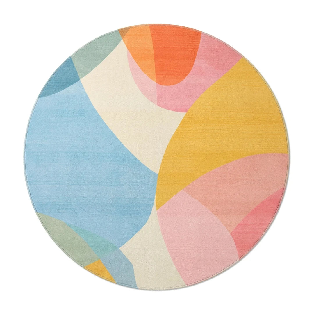 Tapis rond multicolore pastel vu de dessus sur fond blanc