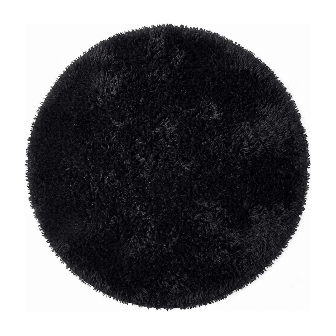tapis-rond-salle-de-bain-noir, vue de dessus sur fond blanc