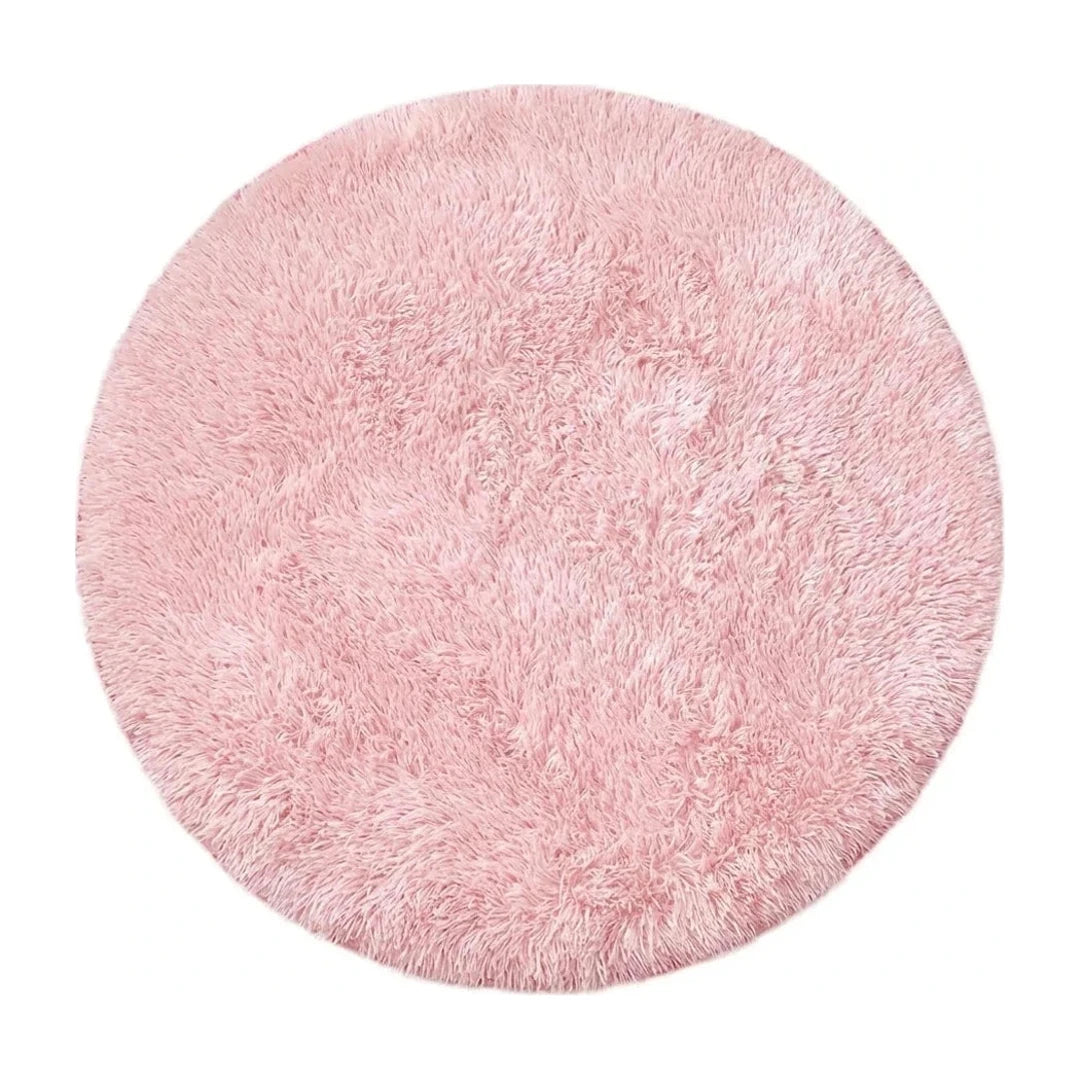 tapis-rond-salle-de-bain-rose-pale, vue de dessus sur fond blanc