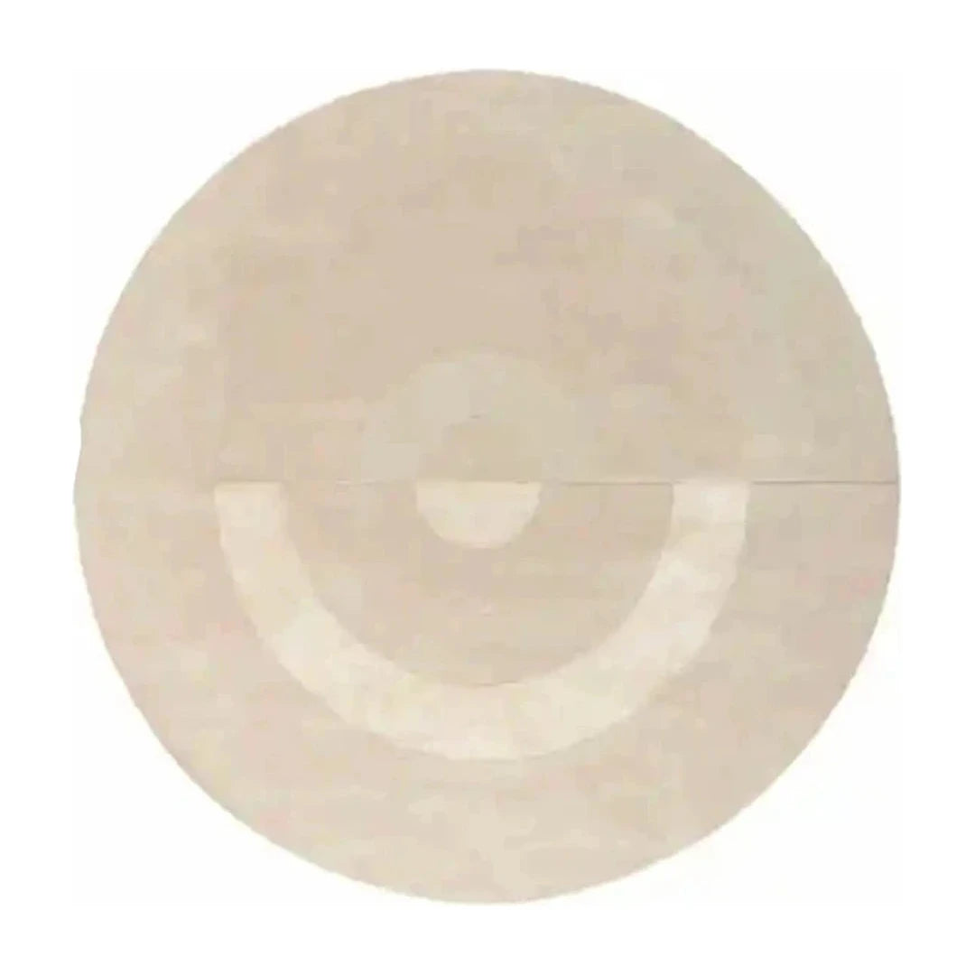 Tapis rond salon cercles concentriques beige crème, vue de dessus sur fond blanc
