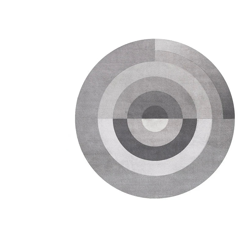 Photo originale du tapis rond salon cercles concentriques gris, vue top-down studio