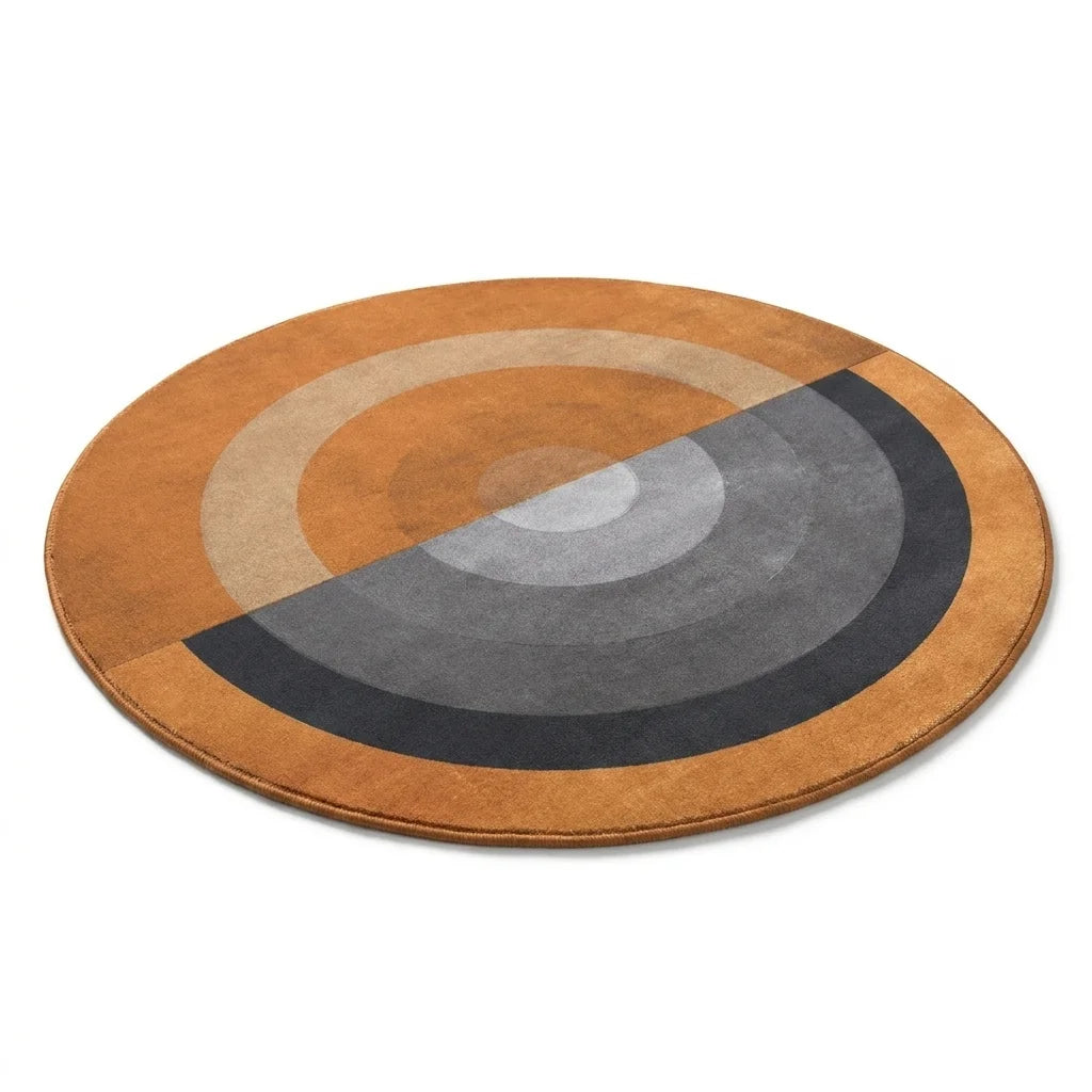 Vue studio du tapis rond salon cercles concentriques orange brûlé, fond blanc, épaisseur visible