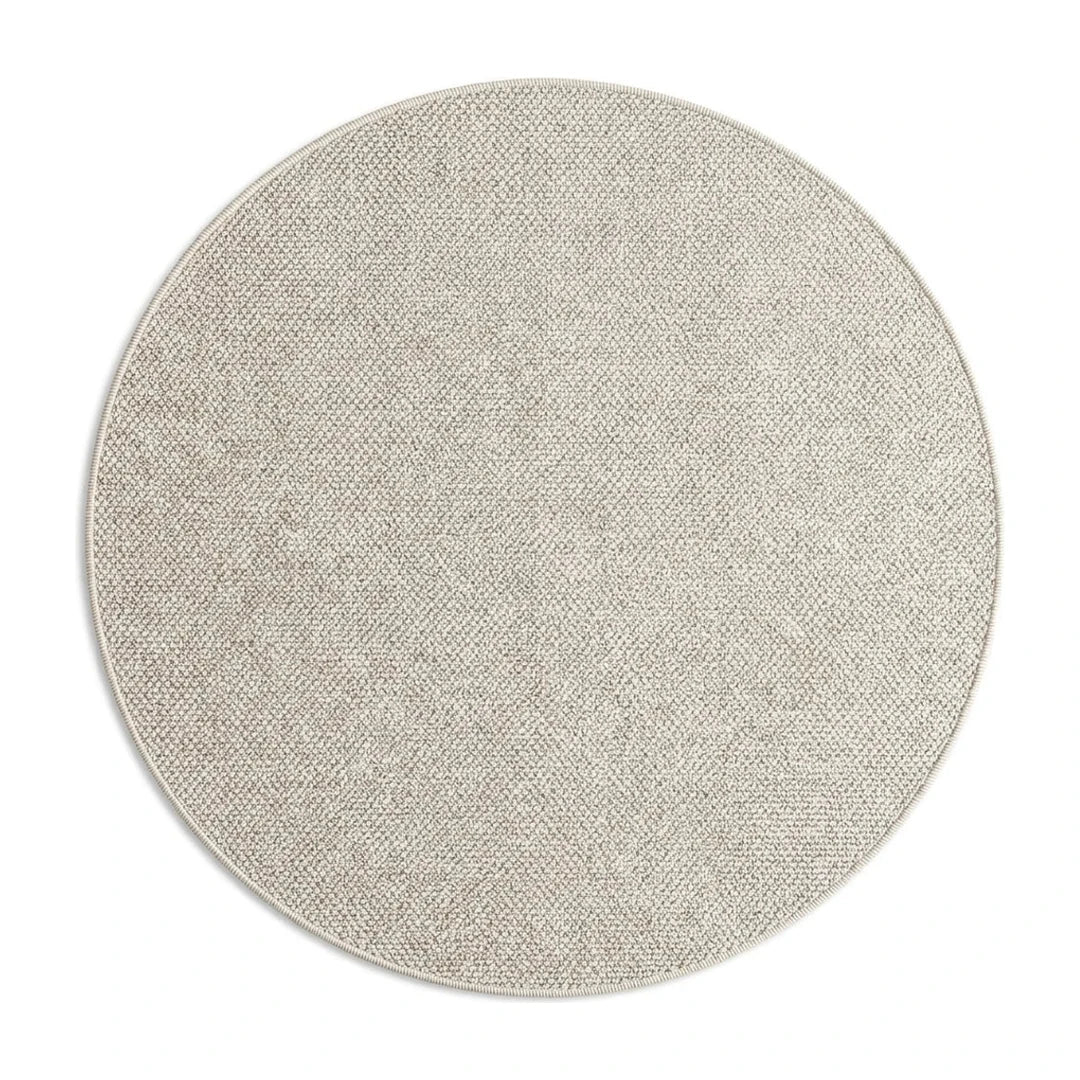Tapis rond Wilton tissage plat écru, vue de dessus sur fond blanc