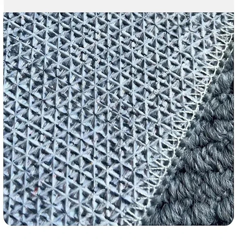 Vue détaillée de l'envers antidérapant TPR du tapis rond Wilton gris ardoise