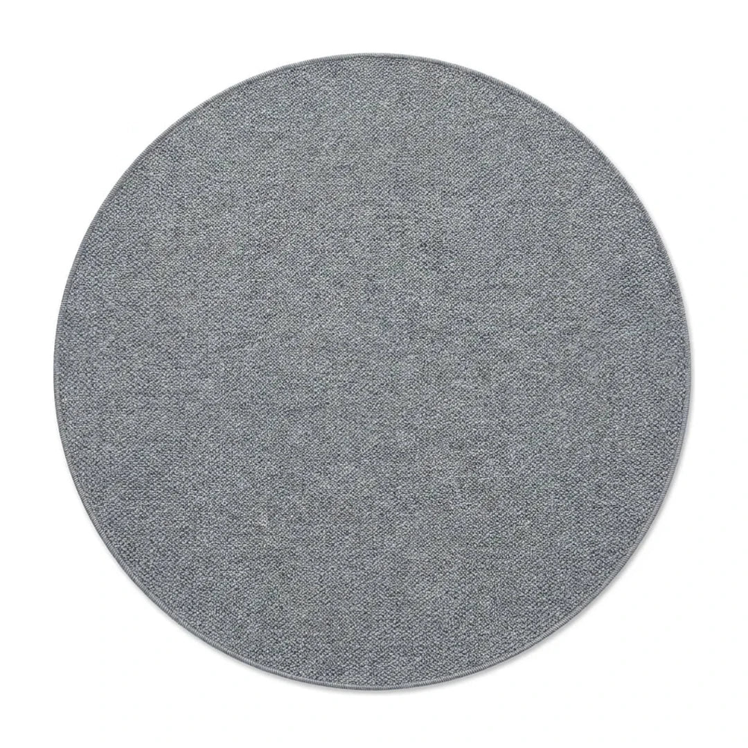 Tapis rond Wilton tissage plat gris, vue de dessus sur fond blanc